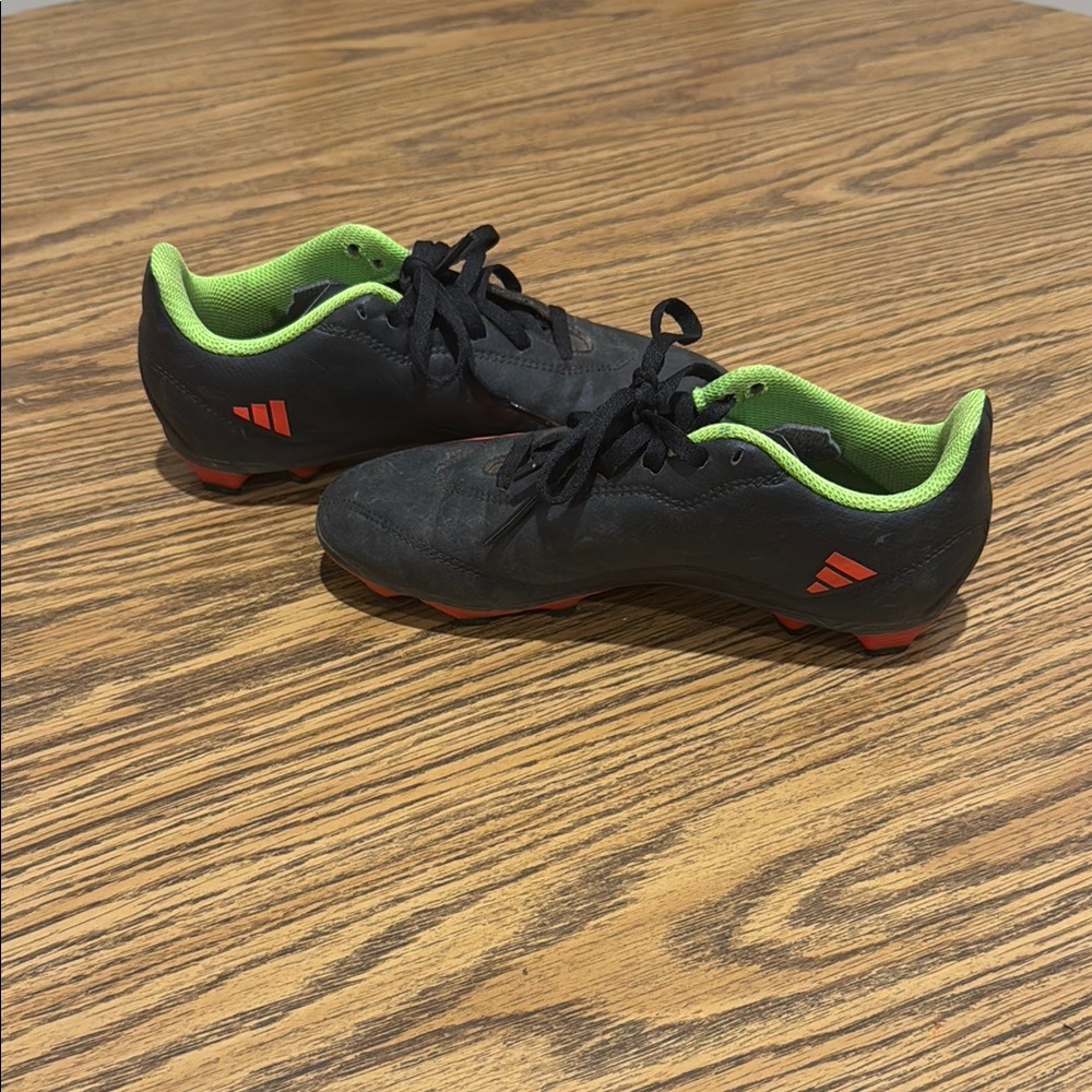 Black and Green Soccer Cleats